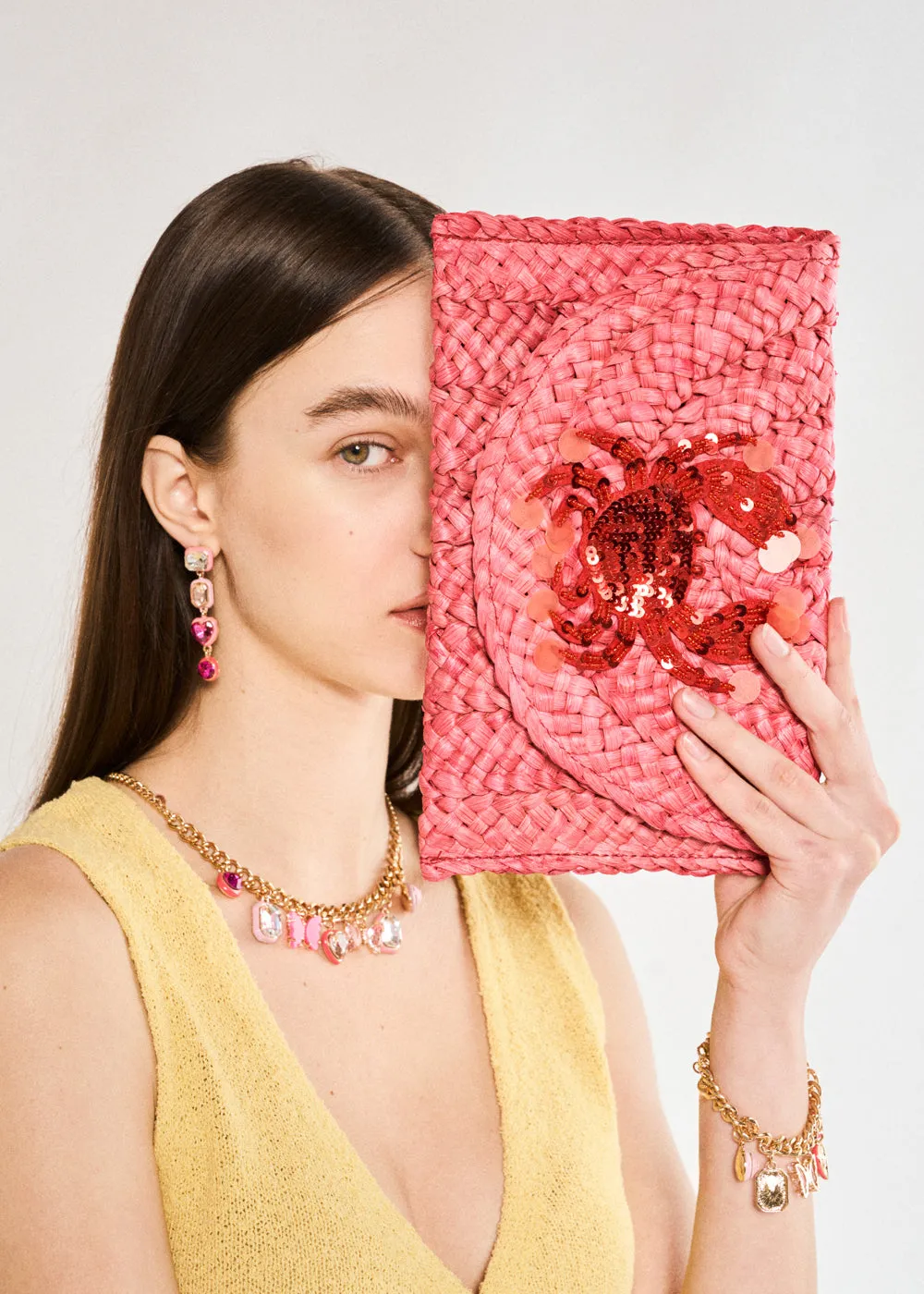 SHELLY CLUTCH IN RAFFIA