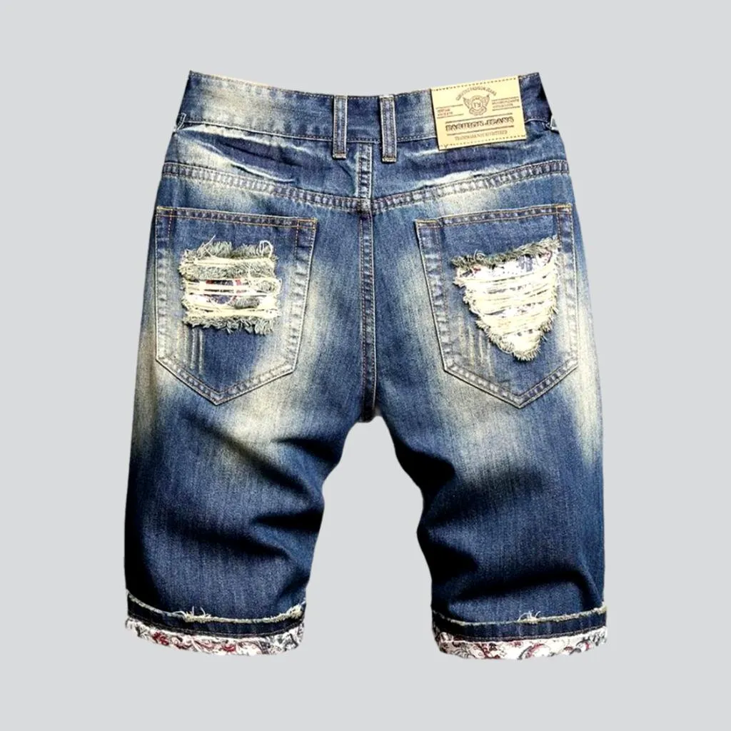 Vintage blue distressed denim shorts